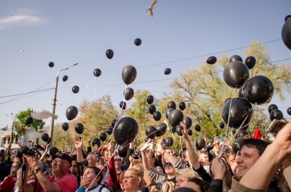 White doves and black baloons.
